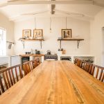 Professional real estate photography of a minimalist kitchen design in an Overberg coastal home.
